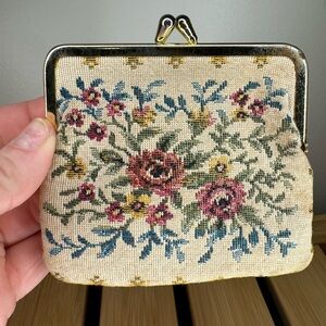 Vintage petite point coin purse featuring a floral design and a kiss-lock clasp.